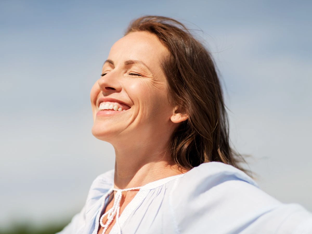 Woman smiling outside
