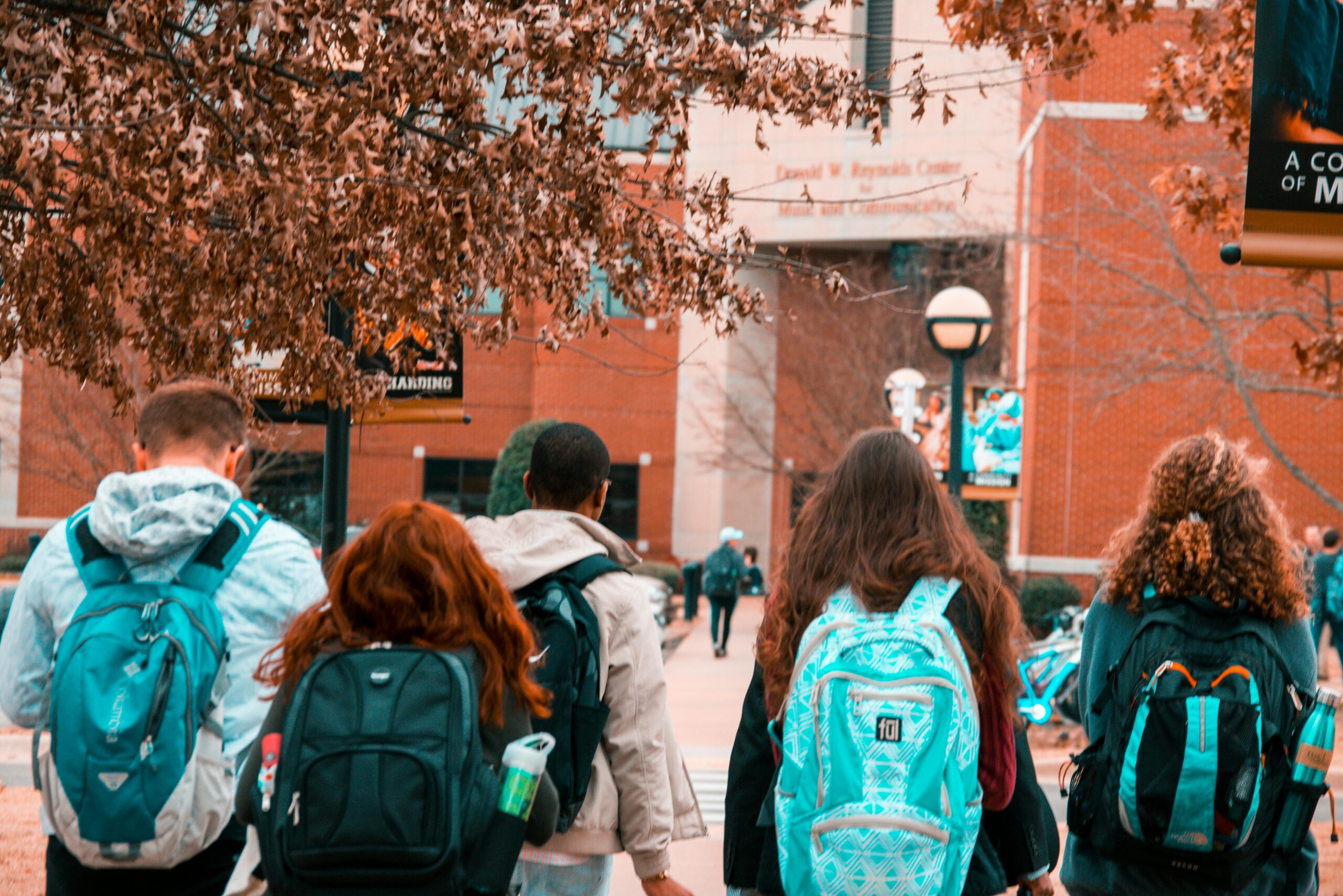 friends walking to class before scheduling an Invisalign consultation with the Best Dentist Bethesda